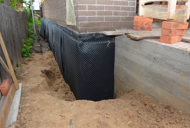 SJ Waterproofing Pros technician performing targeted Crawl Space Encapsulation assessment in Ossian, IN